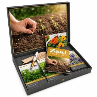 Rijk gevulde geschenkdoos vol met kruidenzaden en bijbehorende zaai artikelen